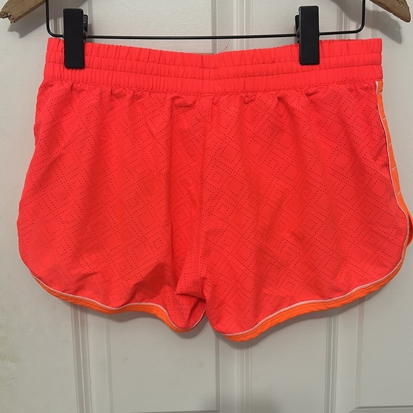 Under Armour semi fitted heat gear running shorts Size small bright pink orange - Picture 2 of 5